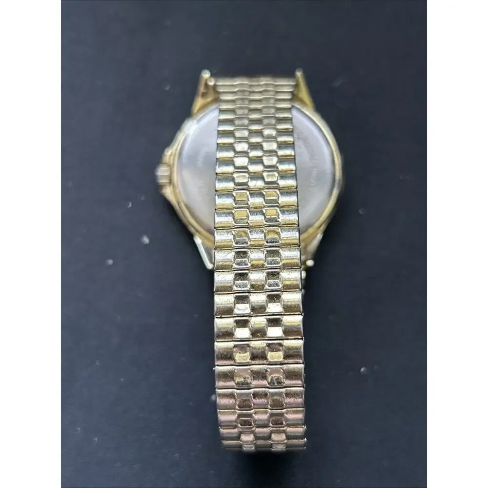 Gold Tone Black Dial Men’s Stretch Band Quartz Watch